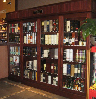 https://www.winestoreracks.com/images/custom-wood-security-case.jpg