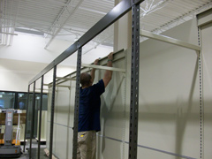 Warehouse-style liquor store shelving installation